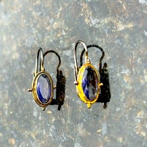 Translucent faceted blue stone earrings appear to be antique